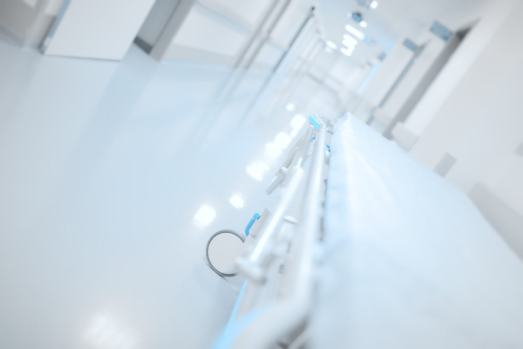 Illuminated long corridor and gurney in the hospital
** Note: Shallow depth of field